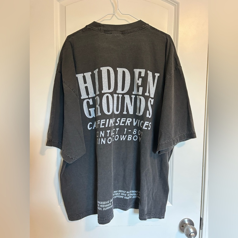 Black/ gray hidden grounds coffee Wilmington dino-cowboy